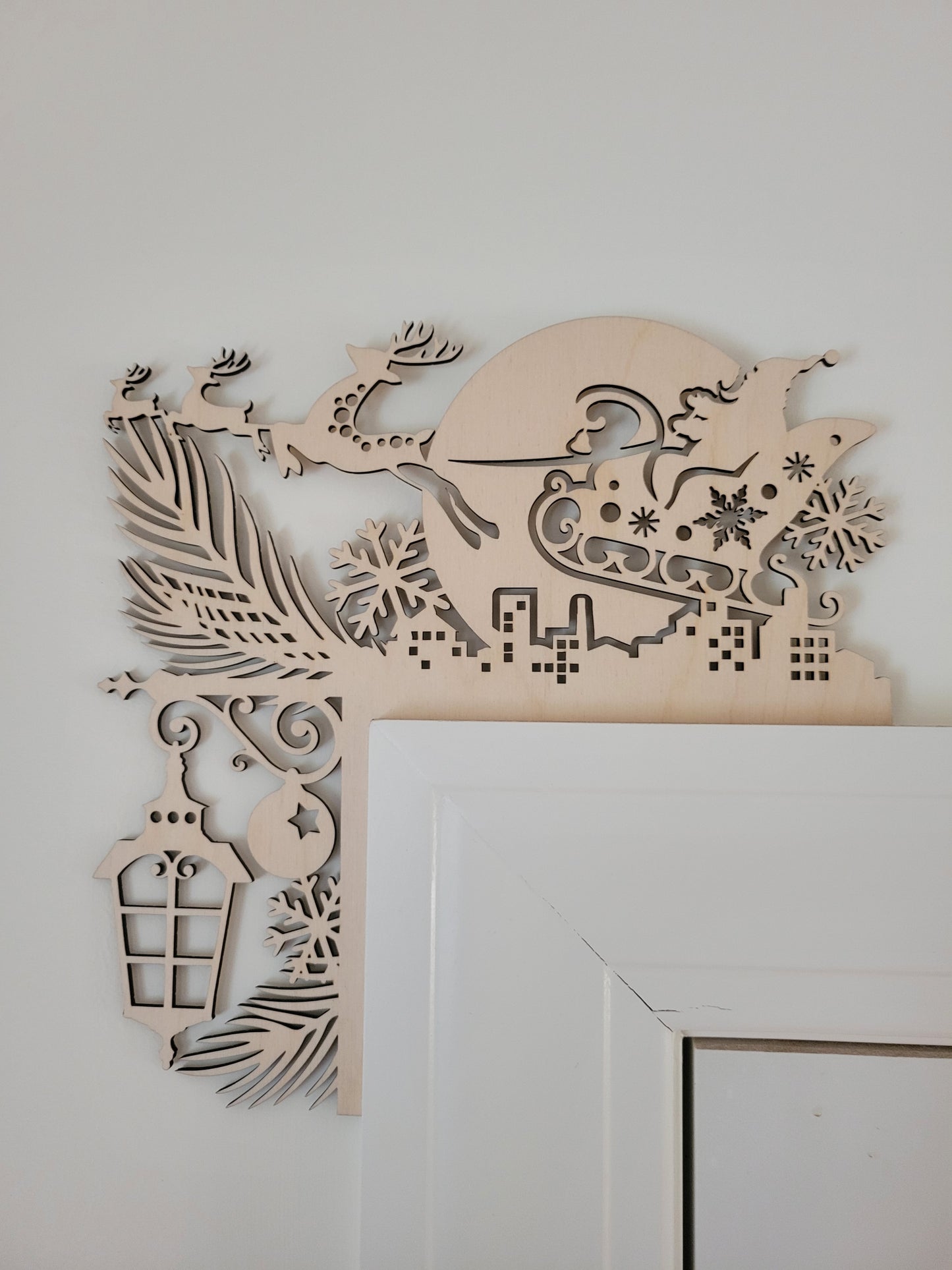 Santa in sleigh laser cut door corner wood decoration, handcrafted Christmas entryway accent veteran-made in Massachusetts